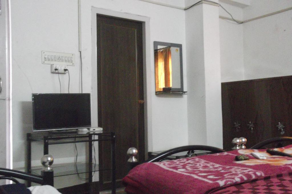 Megacity Inn Колката Стая снимка